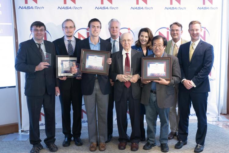 Representatives from each of the three finalist teams. CU Boulder professor Ivan Smalyukh and PhD student Andrew Hess are on the far left.