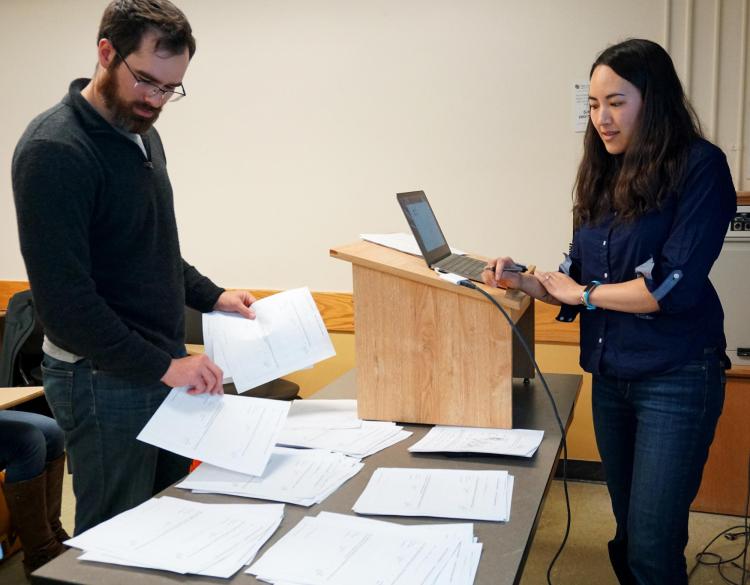 Kyri Baker and a student in the classroom