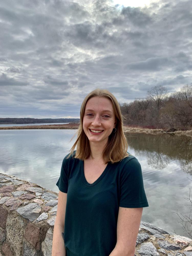 Erica Landreth outdoors by a lake
