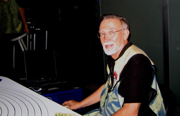 Stewart Woodward volunteering at the Denver Museum of Nature and Science teaching astronomy and aerospace.