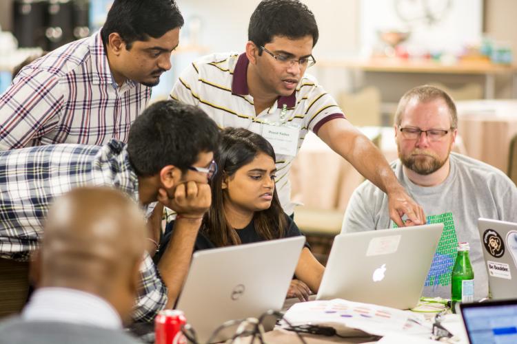 CU ITP students participate in hackathon.