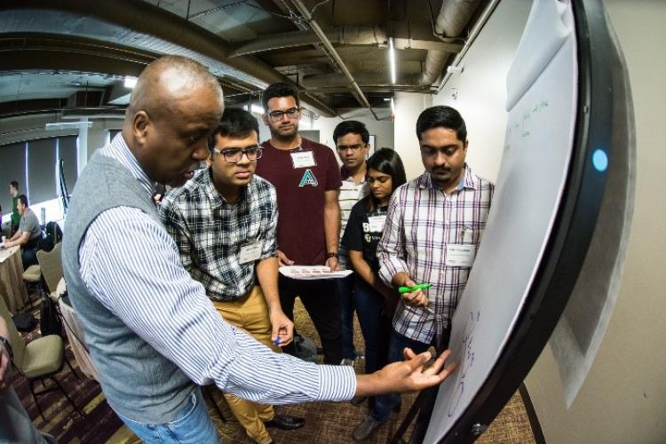 Students participate in hacking event.