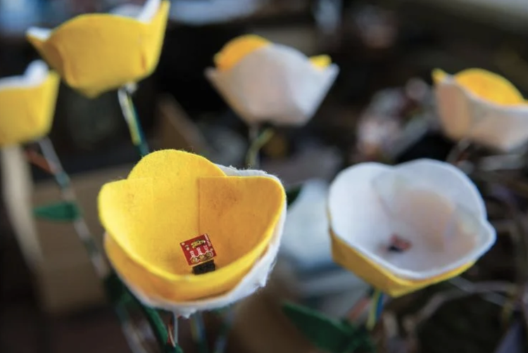 Paper flower with microchip in center