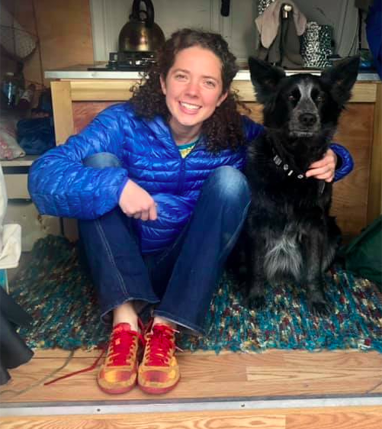 Abbie Weeks in her converted camper van with her dog