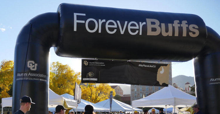Picture from event with ForeverBuffs branded arch at the entrance.