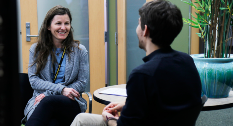 Student meets with a counselor through CAPS program