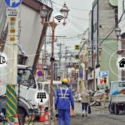 A man walking through rubble with graphics for emergency response around him