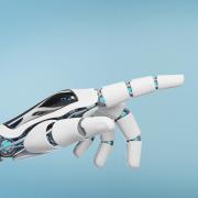Robot hand on a blue and grey background 