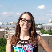 Ashley Pennington poses with the Capitol dome in the background