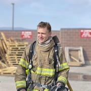 Ben Chilton in full firefighting gear