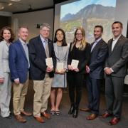 The three Global Engineering Award winners pose with Mortenson Center staff and the college's dean, Bobby Braun. 