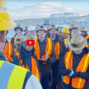 A Denver Water representative leads students on a tour of the existing treatment plant. 