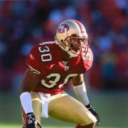 Donald Strickland on the football field for the San Francisco 49ers.