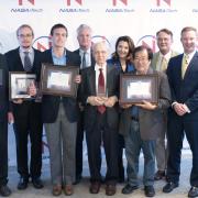 Representatives from each of the three finalist teams. CU Boulder professor Ivan Smalyukh and PhD student Andrew Hess are on the far left.