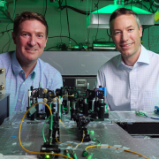 Scott Diddams, left, and Greg Rieker in the lab