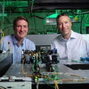 Quantum Engineering Initiative lead Greg Rieker, right, with Scott Diddams in the lab. 