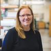 Kristi Anseth with her lab blurred in the background.
