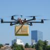 Drone delivering a package.