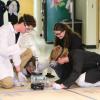 Students get their car ready at the AICHE Chem-E-car regional competition.