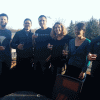 The Stateless team toasts to their new funding. 