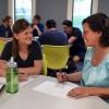 Two women discussing their ideas 