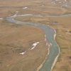 A river with snow seen from the air