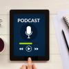 An Ipad playing a podcast