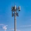 A cell tower on a sunny day.