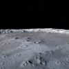 The surface of the moon with empty space in the background