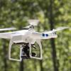 A drone flying in the woods