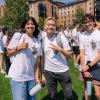 Four first-year students in matching T-shirts at the college's kickoff BBQ for Engineering Connections