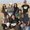 Students in the field with the box