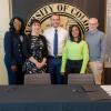 FRCC's president and CU Boulder's provost pose for a group photo with students in the CASE Chancellor's Hall
