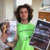 Student Aristotle Bougas holds his comic books and care package items