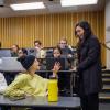 Azadeh Bolhari talking with a student in her classroom