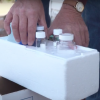 Water samples collected from the communities and stored in a travel container.