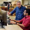 A professor and student in a lab
