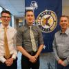 Timothy Barentine and Joseph Crawford stand with Dean Bobby Braun.