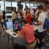 Students visit booths in the lobby during the 2017 activities fair. 