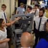 A student discussing her project with Expo attendees.