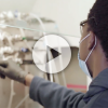 A researcher in a chemical and biological engineering lab at CU Boulder.