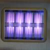 UV light being emitted by a krypton chloride excimer lamp