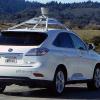 A Google self-driving car with lidar on top, cruising the interstate in California