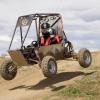 The vehicle getting air on a course.