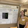 Keala Gapin shows a poster