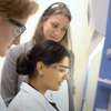 CU Boulder researcher Laurel Hind in her lab with students