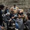 MARBLE team members gather around a laptop to look at the course map