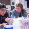 Professor Lynch with a student in the lab