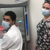 Marina Nieto Caballero and Eddie Fuques Villalba prepare to assess the infection potential of murine coronavirus in CU Boulder lab