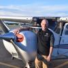 Max Funck, an exchange student from Germany, with small plane.